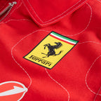 Ferrari shield patch on red team jacket fabric