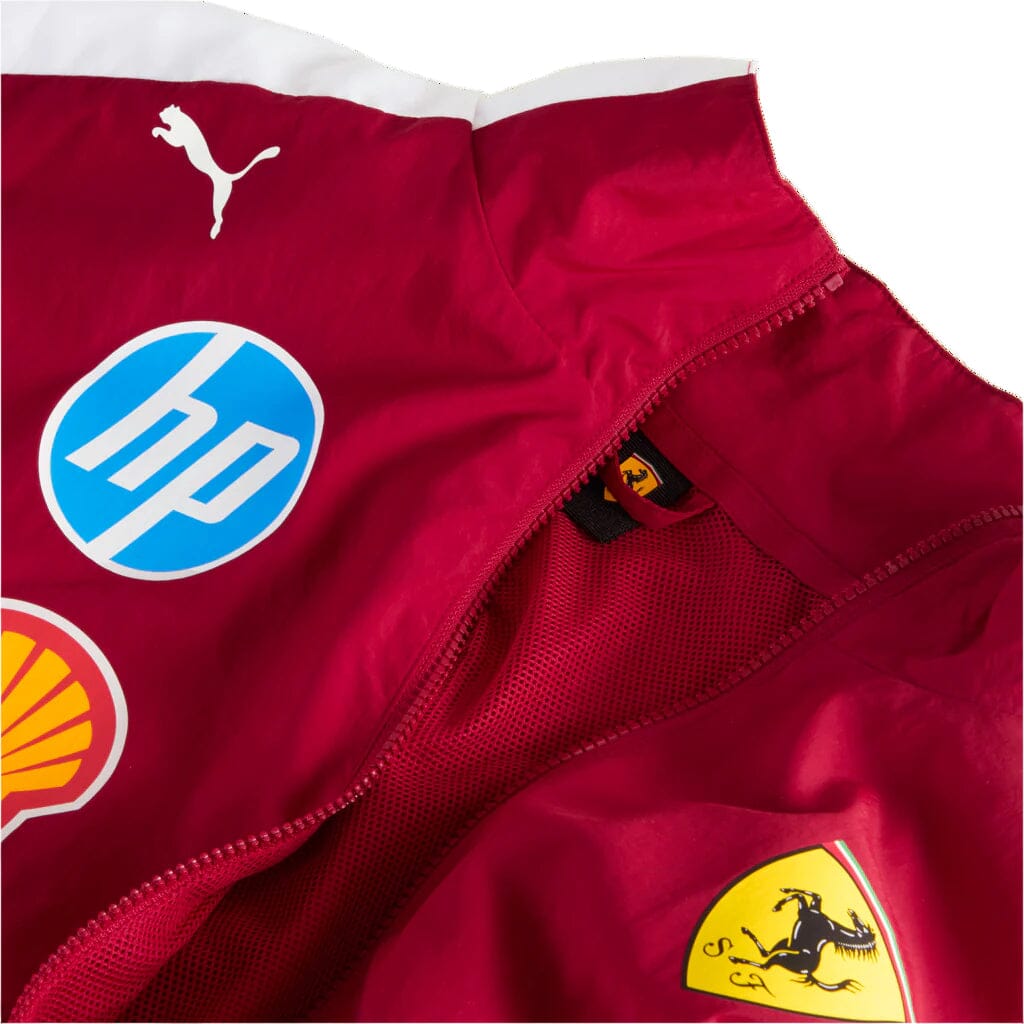 Dark cherry jacket detail with zip placket and HP logo patch at chest