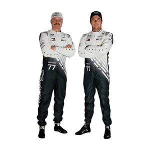 Two individuals wearing racing suits with visible branding on a white background
