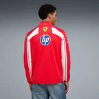 Red softshell jacket back with white vertical stripes and Ferrari crest on yoke